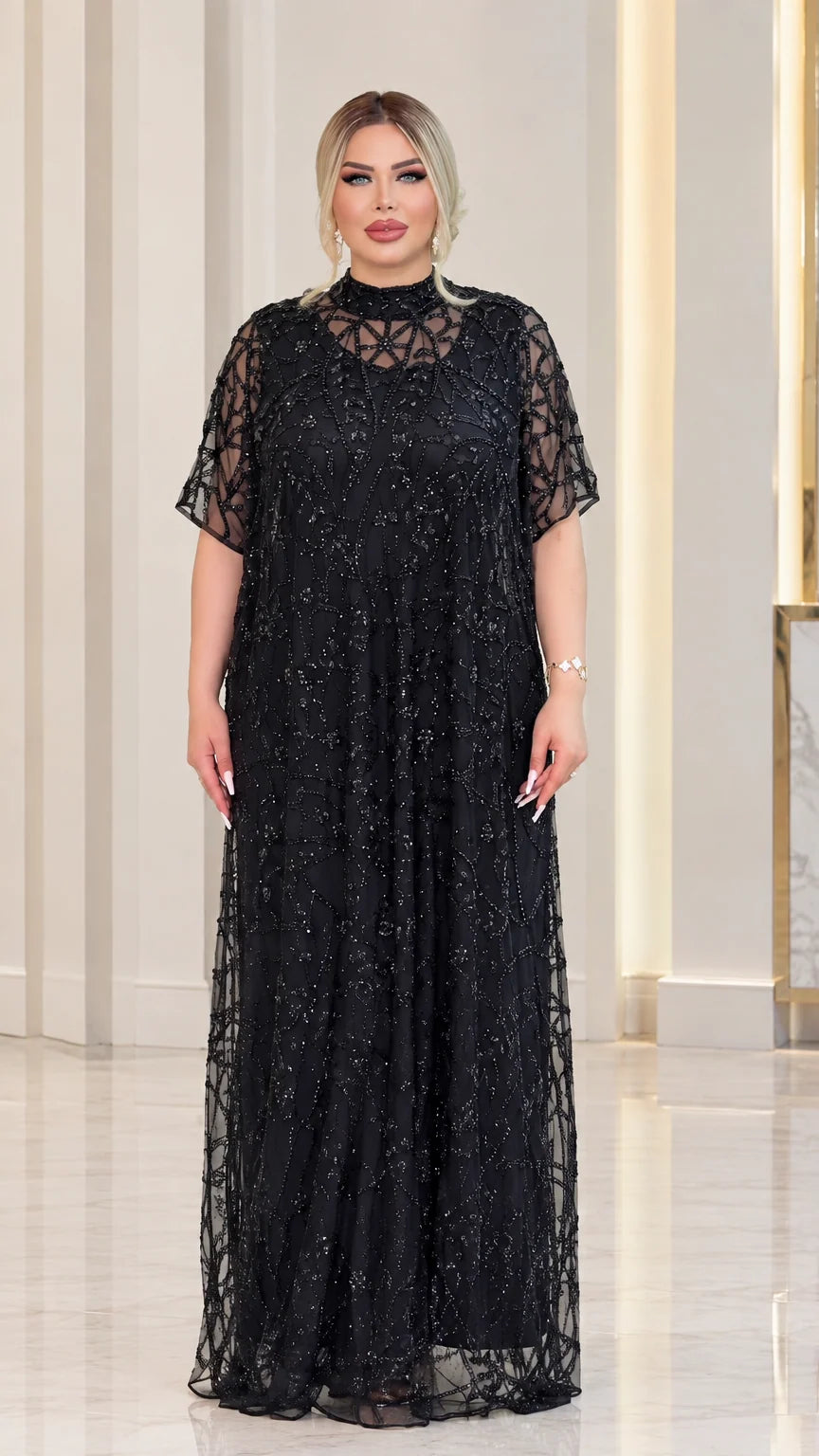 Front view of black beaded high neck short sleeve maxi evening dress