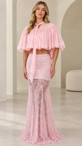 Front view of model wearing pink two-piece sequin lace maxi dress with pleated capelet
