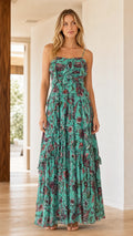 Front view of model wearing Teal floral ruffle tiered maxi dress
