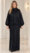 Front view of model wearing black fringe mock neck two-piece maxi dress set