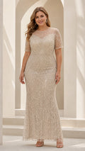 Front view of woman wearing Champagne beaded short sleeve evening maxi dress