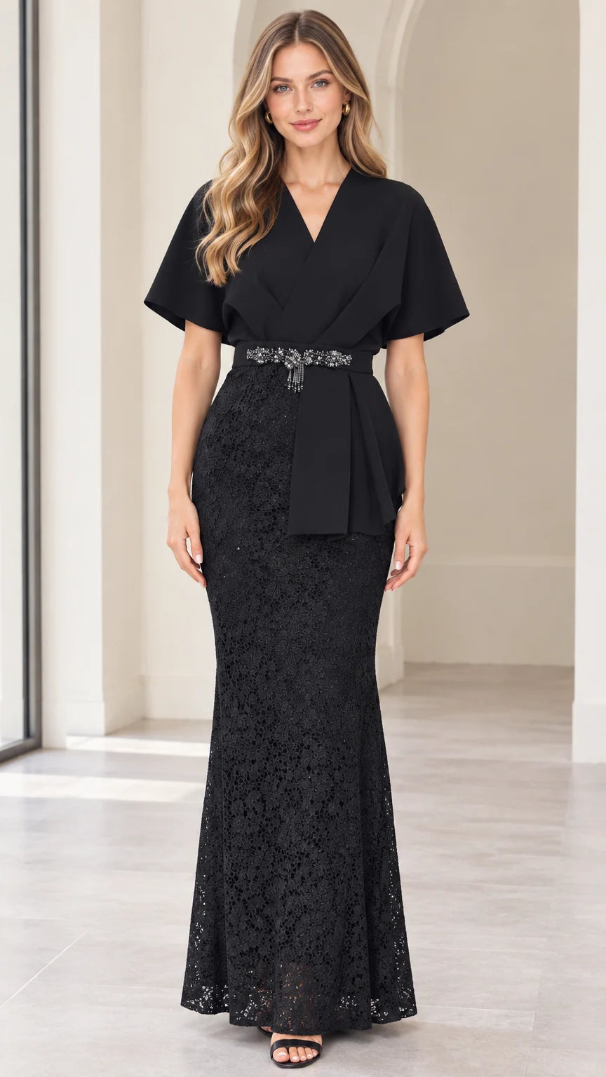 Front full-length view of model wearing black flutter sleeve lace evening maxi dress