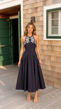 Navy blue halter neck embroidered drop waist midi dress front view