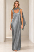 Front view of woman wearing silver shimmer sleeveless maxi dress with matching grey crochet scarf