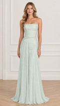 Front view of model wearing sage green strapless pleated evening gown