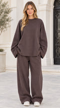 Full front view of model wearing espresso brown oversized sweatshirt and wide-leg sweatpants lounge set