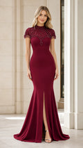 Model wearing Burgundy Beaded High Neck Mermaid Evening Gown front view