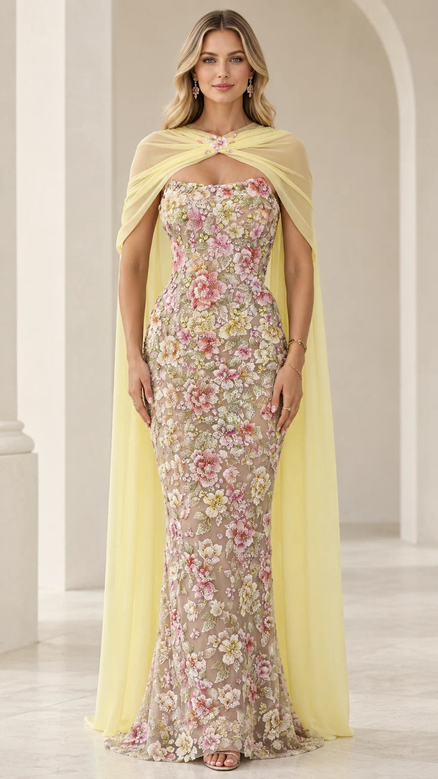 Pastel yellow floral embroidered strapless evening gown with sheer chiffon capelet front view