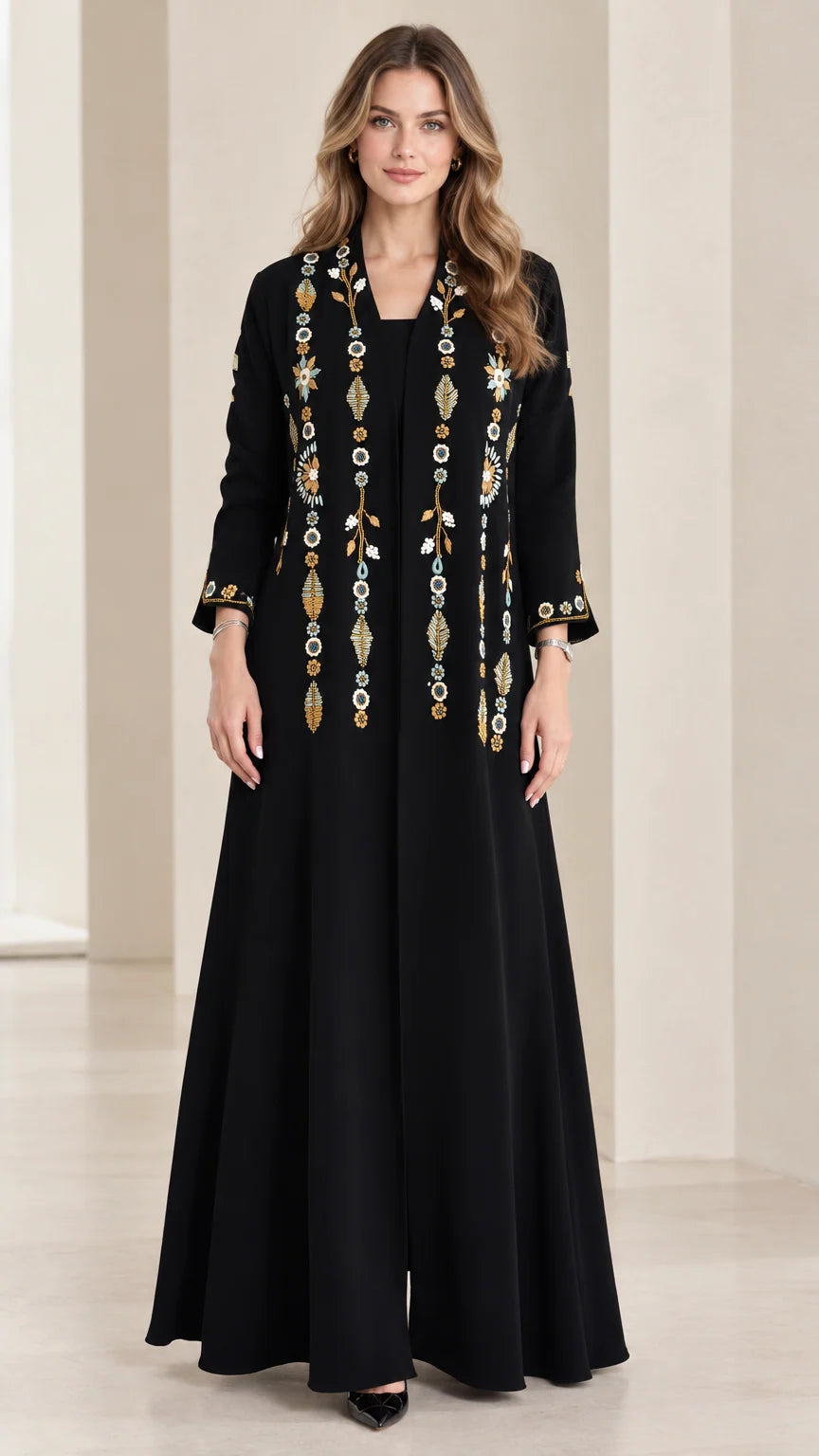 Front view of black embroidered long sleeve maxi dress