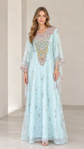 Front full-length view of woman wearing Light Blue embroidered kaftan maxi dress