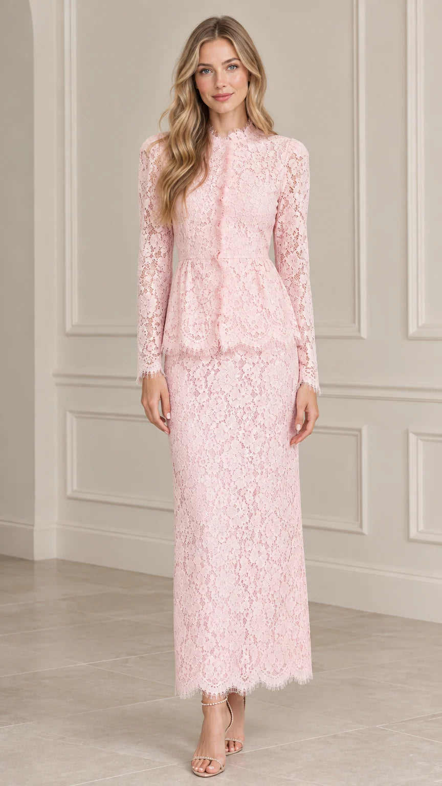 Front view of model wearing Blush Pink floral lace peplum long sleeve maxi dress
