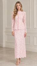 Front view of model wearing Blush Pink floral lace peplum long sleeve maxi dress
