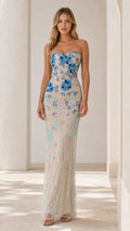 Front view of champagne strapless floral beaded evening gown
