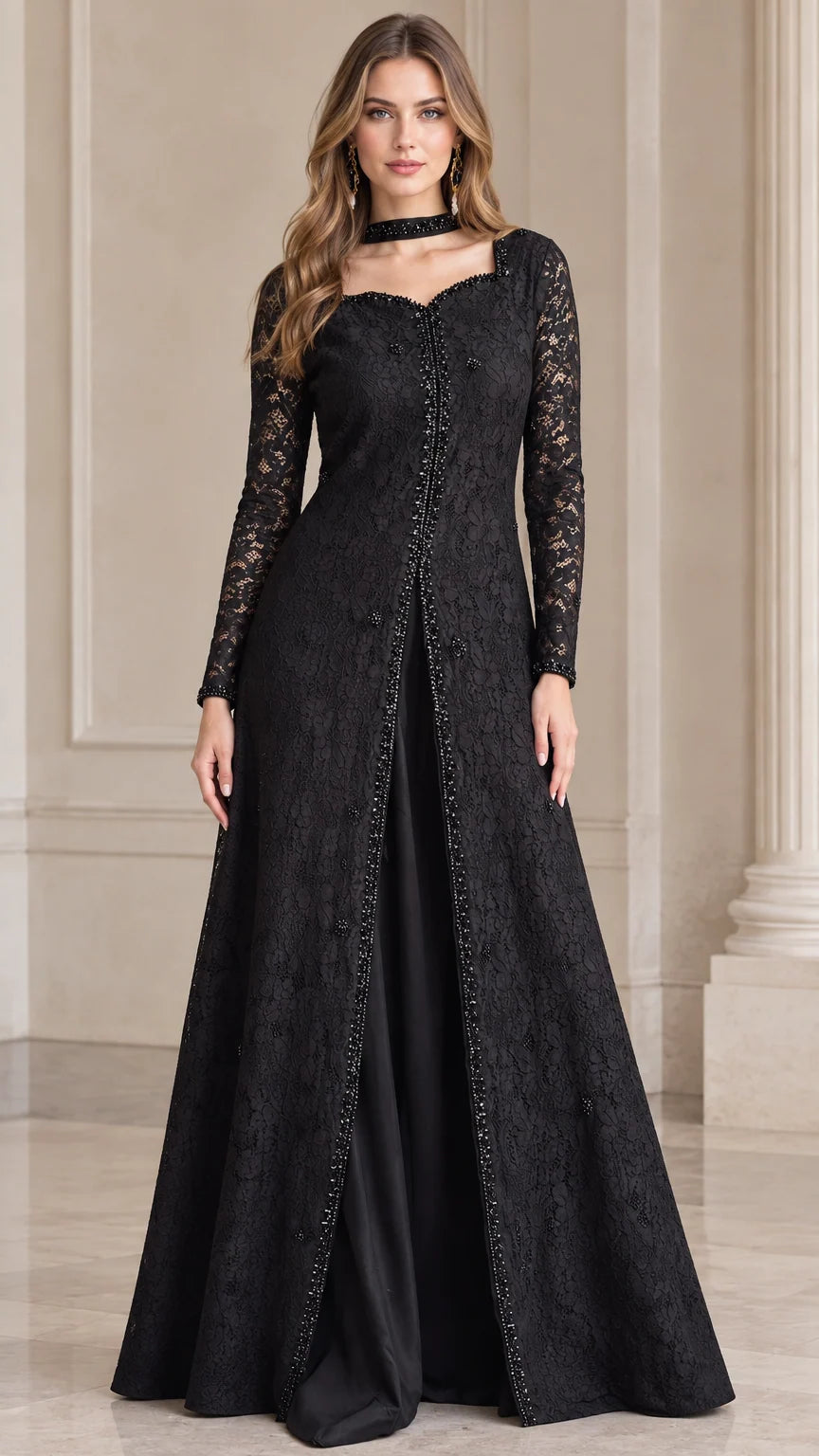 Front full view of black beaded lace overlay evening gown with sheer long sleeves