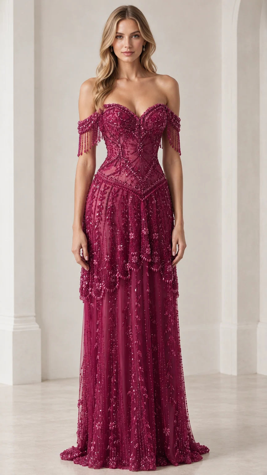 Front view of burgundy off-shoulder beaded evening gown with fringe details