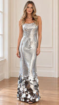 Front view of model wearing silver sequin maxi gown with disc paillette hem