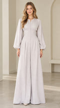 Front view of model wearing dove grey lantern sleeve wide leg jumpsuit