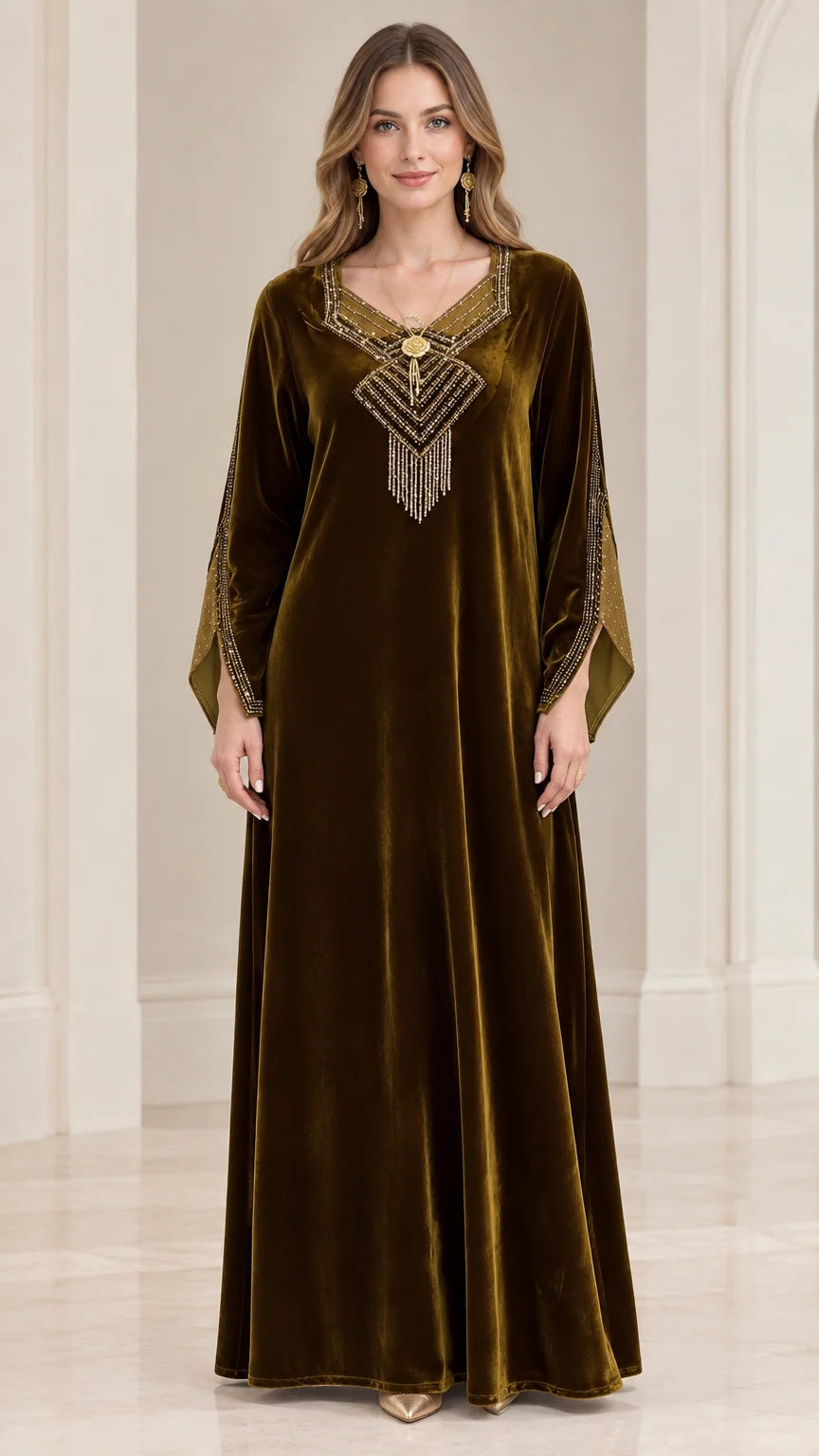 Front view of woman wearing olive green velvet kaftan maxi dress with beaded V-neck fringe