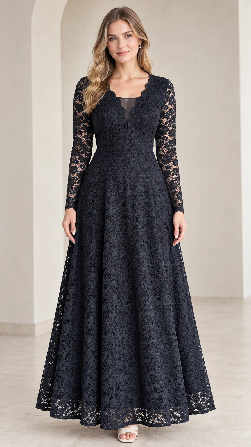 Front view of model wearing Navy Blue long sleeve lace maxi dress with scalloped V-neck