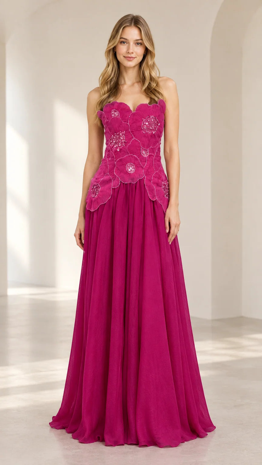 Front view of model wearing magenta strapless 3D floral chiffon evening gown