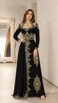 Front view of black embroidered long sleeve kaftan evening gown