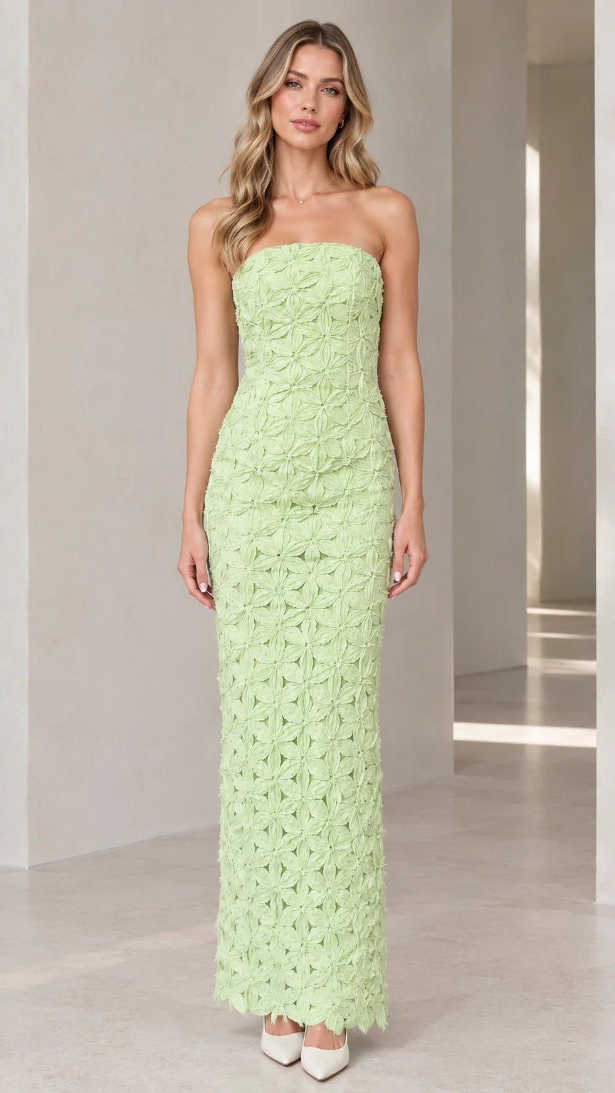 Front full-length view of model wearing mint green strapless 3D floral maxi column dress