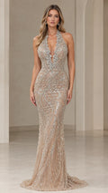 Front view of model wearing a champagne crystal halter beaded mermaid evening gown