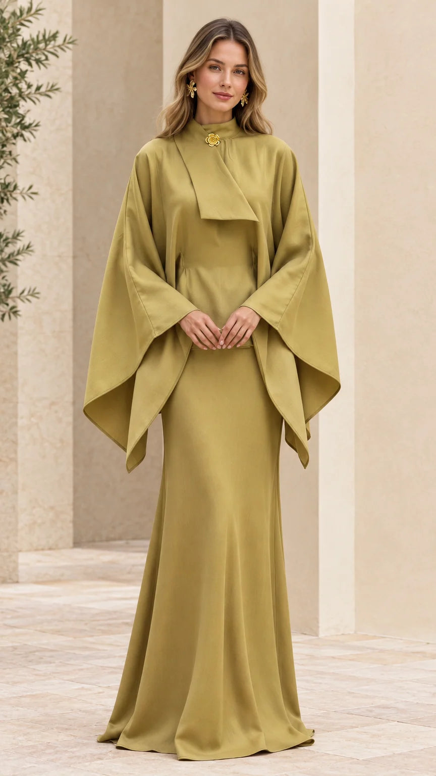 Front view of woman wearing olive green high neck cape sleeve maxi dress