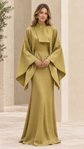 Front view of woman wearing olive green high neck cape sleeve maxi dress