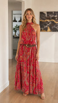 Front view of woman wearing Red Bohemian Paisley Halter Maxi Dress
