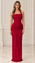 Front view of model wearing red halter shimmer column evening gown