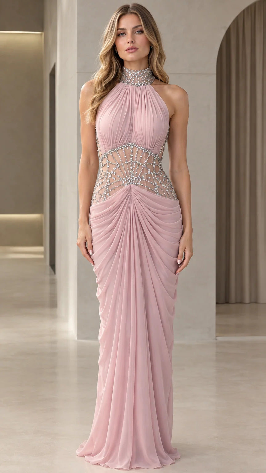Front view of model wearing Blush Pink halter maxi evening gown with rhinestone waist