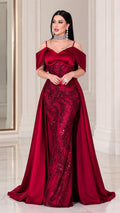 Front full-length view of model wearing Wine Red off-the-shoulder beaded mermaid gown with overskirt