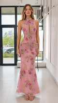Front view of model wearing pink floral sequin halter evening dress