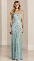 Front view of model wearing Sage Green halter beaded fringe maxi evening gown