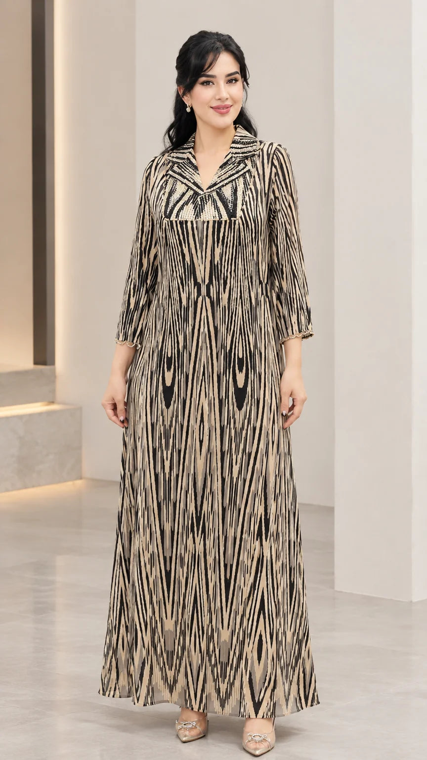 Women's long sleeve sequin-accented printed maxi dress in champagne gold front view