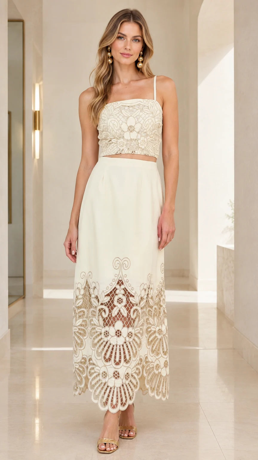 Ivory embroidered crop top and matching cutout maxi skirt two-piece set on model front view