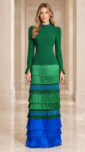 Front view of model wearing Emerald Green embellished high neck tiered fringe maxi dress