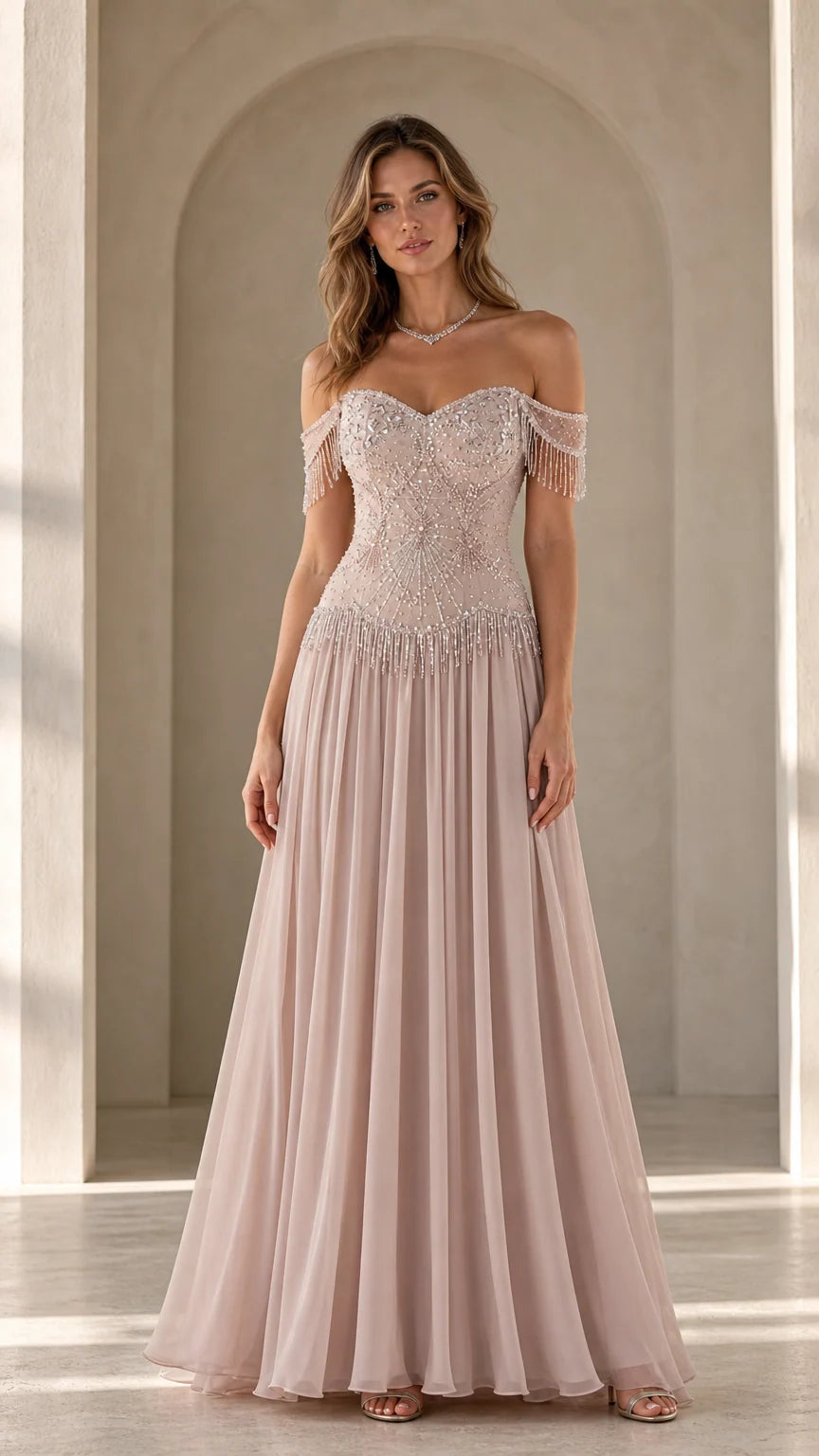 Front view of model wearing blush pink off-the-shoulder beaded chiffon evening gown