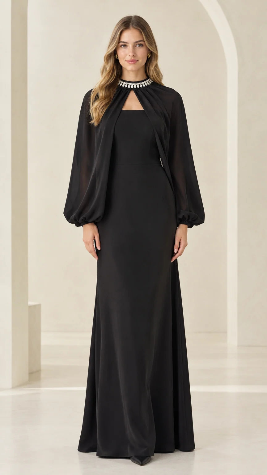 Front full-length view of woman wearing black rhinestone collar cape evening maxi dress