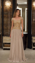 Full front view of model wearing the Champagne beaded cap sleeve pleated chiffon evening gown