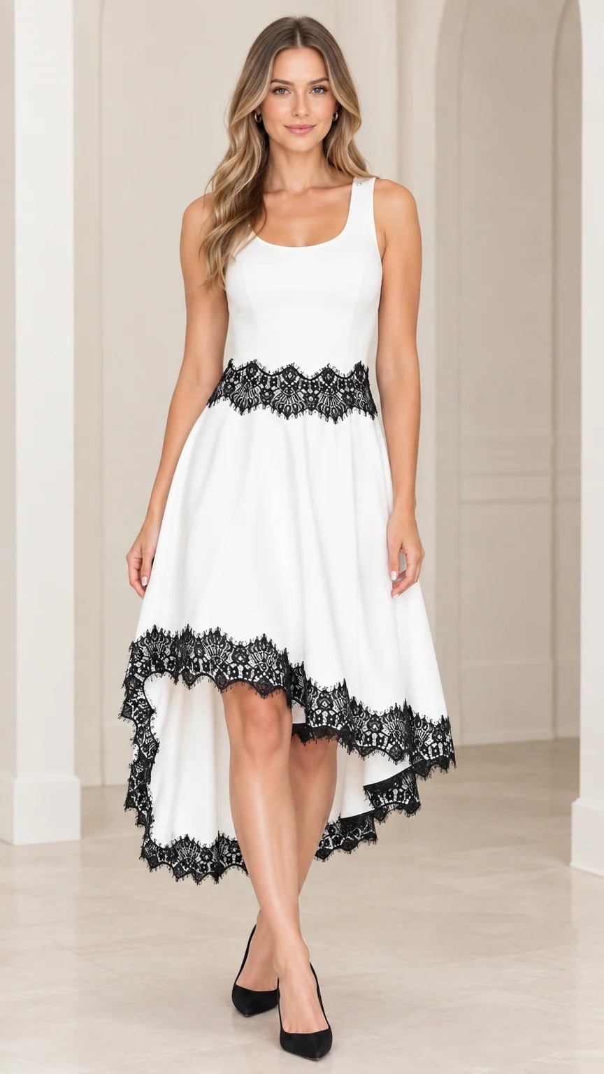 Front view of woman wearing white sleeveless high-low dress with black lace trim