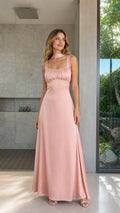 Model wearing Blush Pink ruched bust satin maxi dress with neck scarf front view