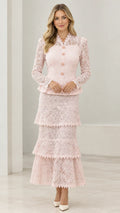 Full front view of model wearing Blush Pink lace peplum jacket and tiered maxi skirt set