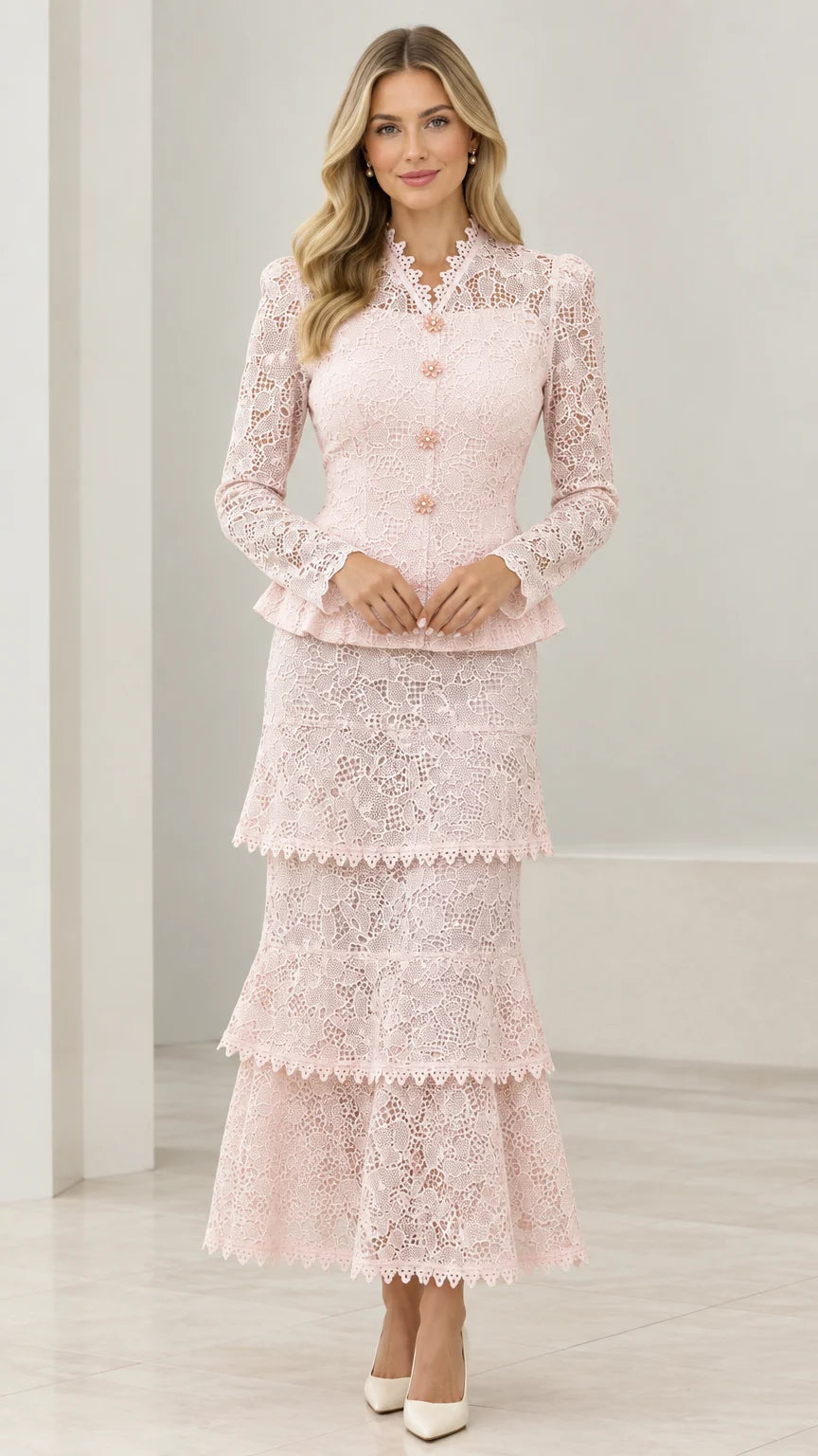 Full front view of model wearing Blush Pink lace peplum jacket and tiered maxi skirt set