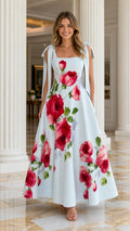 Front view of light blue floral tie-strap maxi dress on model