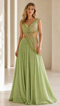 Front view of woman wearing Sage Green embellished cut-out draped maxi gown
