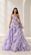 Front full-length view of model wearing lavender one-shoulder embellished ruffle formal gown