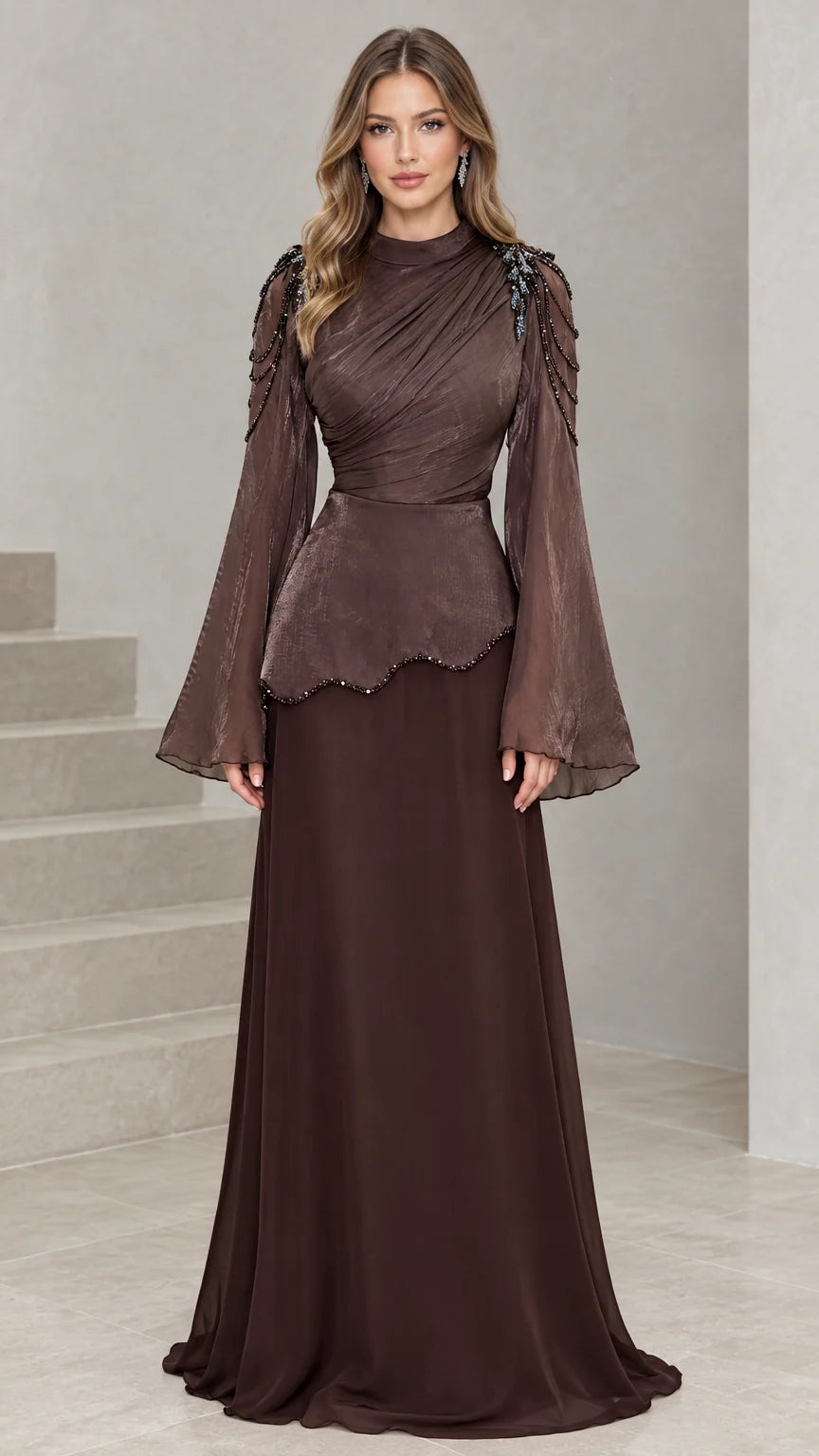 Front view of Chocolate Brown ruched mock neck evening gown with bell sleeves and beaded shoulders