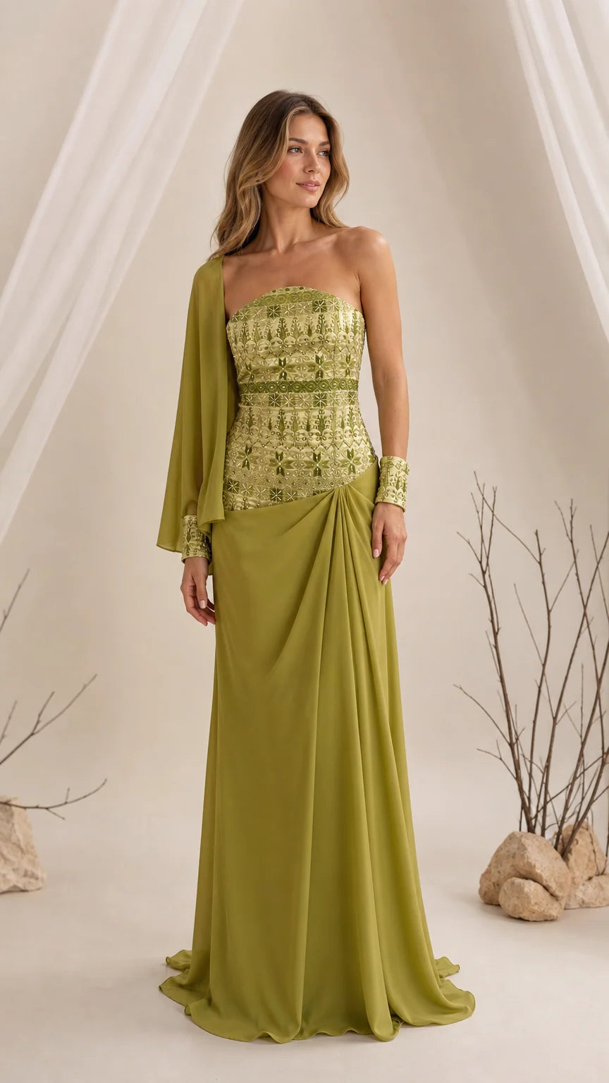 Front view of olive green strapless evening gown with embroidered bodice and side drape